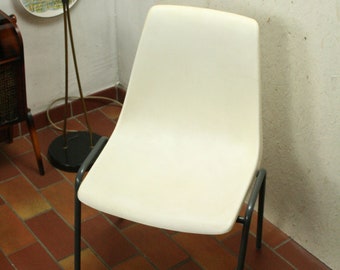 vintage white molded plastic stacking chair by Kusch + Co