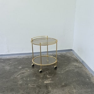 Vintage goudkleurige metalen trolley