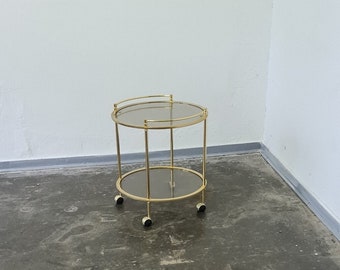 Vintage gold colored metal trolley