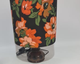 Vintage ceramic side light with a very bright shade