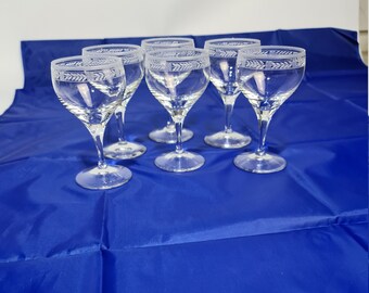 A set  of six cut glass wine glasses by Peill & Putzler