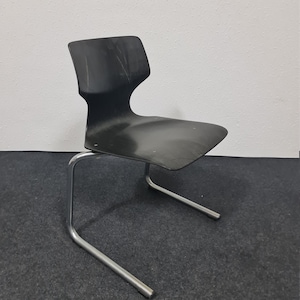 Vintage tubular framed stacking chairs