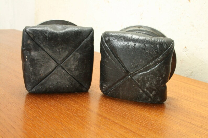 pair of vintage leather and pewter ashtrays