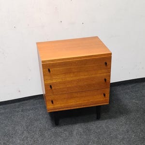 Teak three drawered bedside table