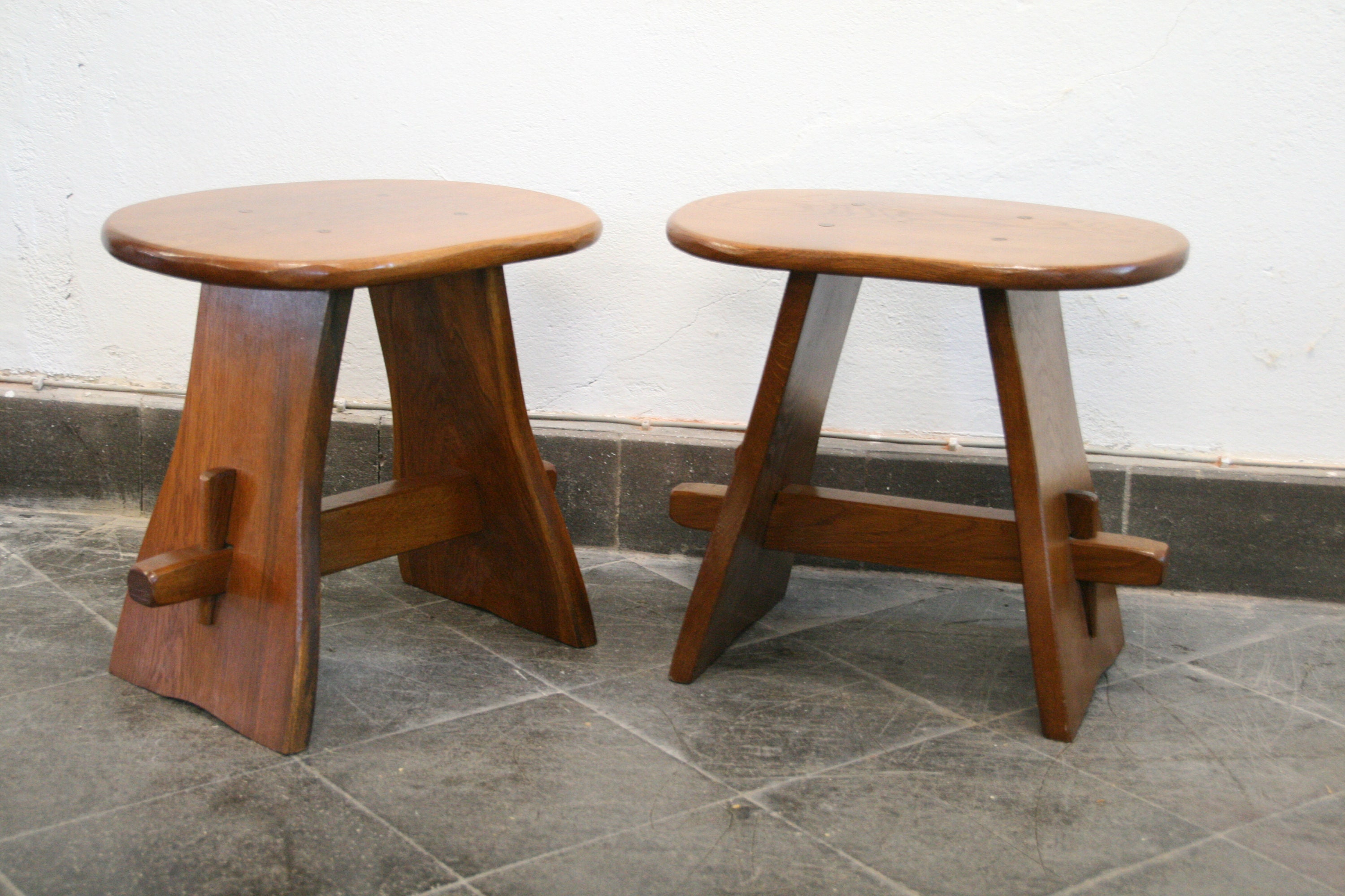 A pair of vintage oak stools