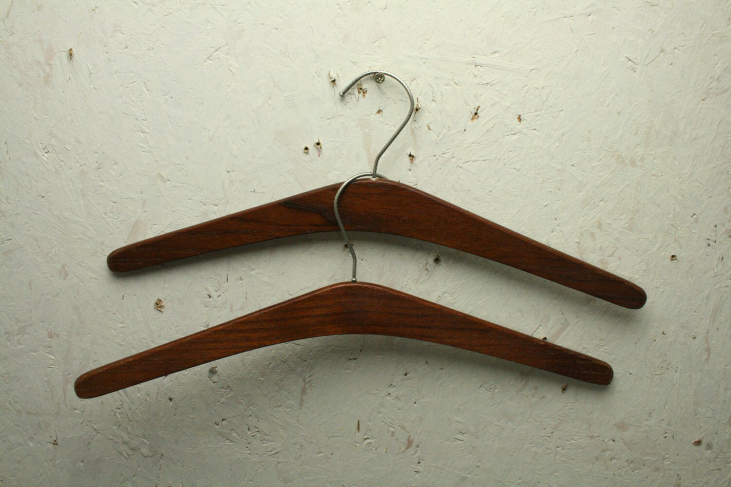 two vintage teak coat hangers