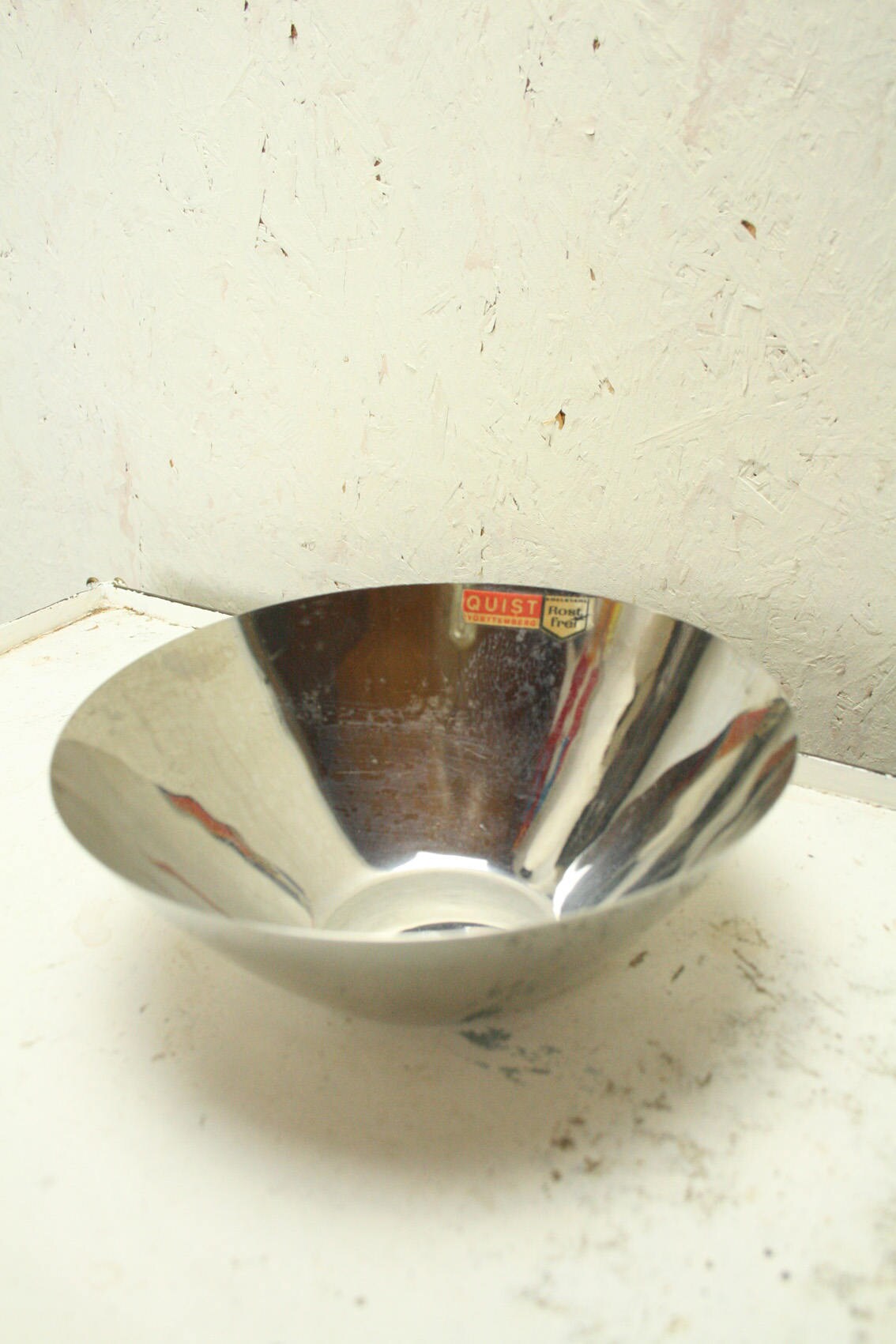Three vintage stainless steel bowls by Quist