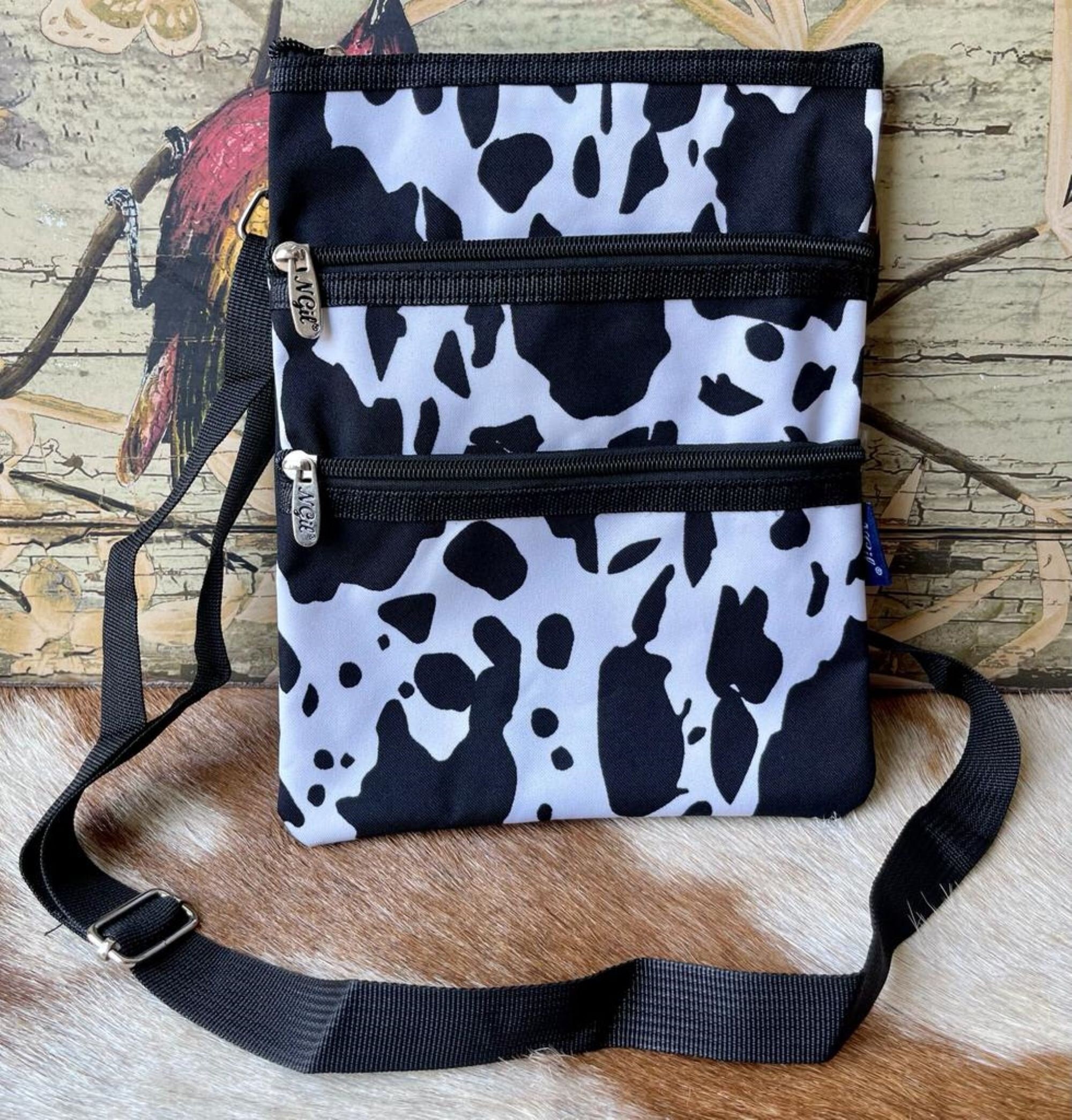 Cow Print NGIL Fashion Faux Leather Mini Purse With Fringe Tassel