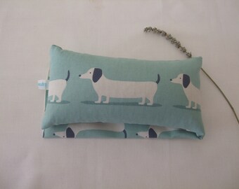 Wheat heat pack /wheat bag with organic lavender in duck egg blue dachshund design.  Microwavable. For comfort, pain relief and relaxation.