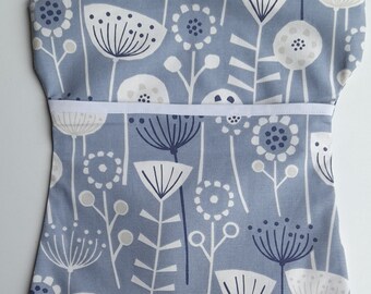 Thick cotton peg bag/ clothes pin bag in a Scandi Bergen design of white flowers & seedheads on a blue background ..