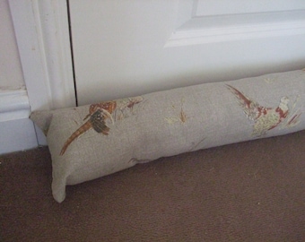Draught excluder / door sausage in pheasant design to fit average door.  Polyester wadding filling with wheat for extra weight.