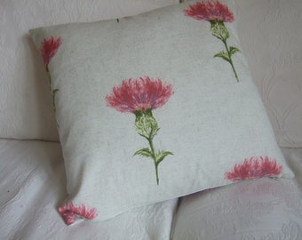 Cushion cover / pillow slip / pillow sham in a  Scottish design of pink thistles on a cream background. Concealed zip fastending.