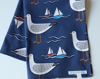 Organic cotton tea towel in Whitby Seagull design in navy.