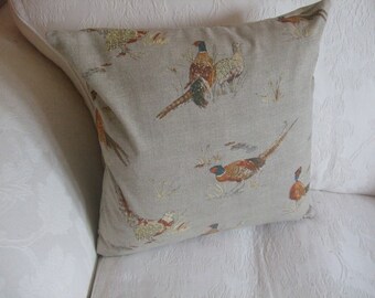 Cushion cover / pillow slip / pillow sham in a  country design of pheasants on a beige background. Concealed zip fastening.