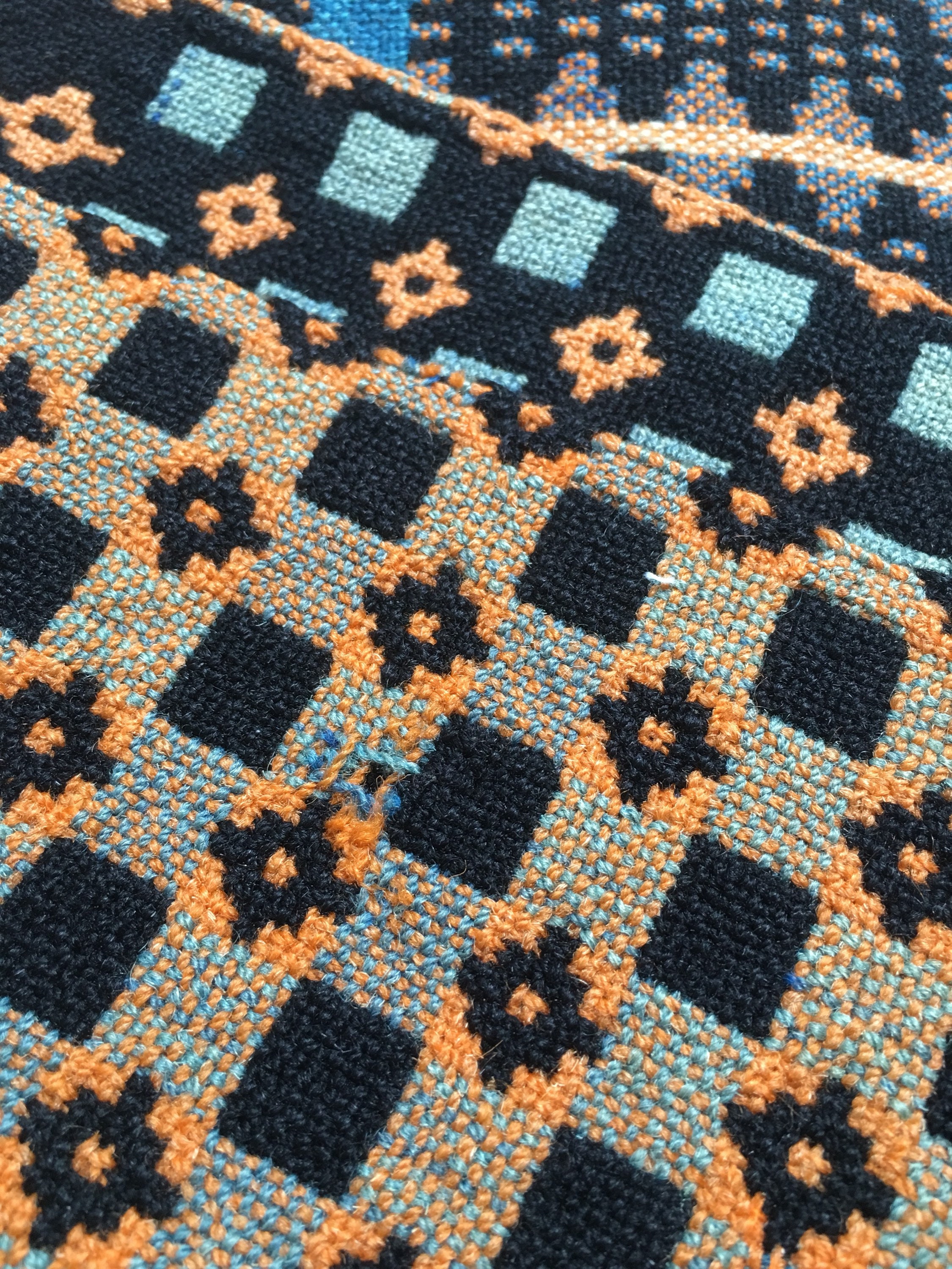 Vintage traditional Welsh Caernarfon woollen throw in orange and blues