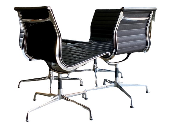 Eames Vitra EA 105 Alu group side chairs in chrome and black leather circa 1980’s