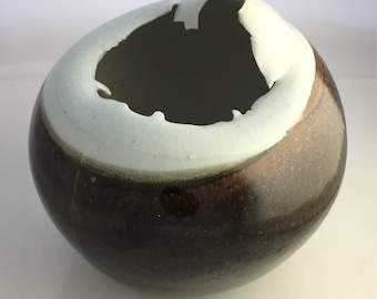 Vintage Porcelain ovoid collapsed form with tenmoku glaze