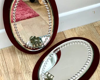 Pair 19th century Irish sorcerers mirrors with candle sconces in red velvet frame