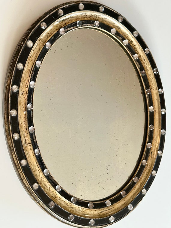 Irish Regency oval mirror with facet bead surround circa 1830