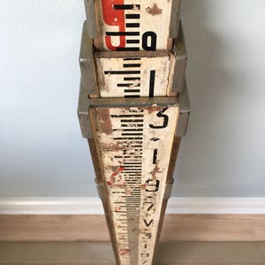 Vintage surveyor's telescopic measuring stick image 1