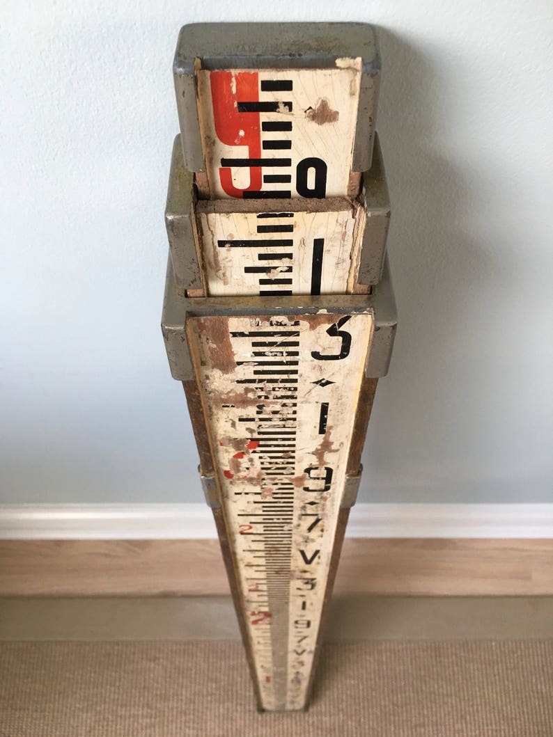 Vintage surveyor's telescopic measuring stick image 1