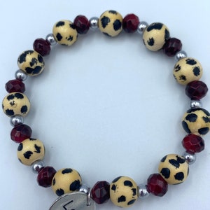 cheetah inspired bracelet with charm