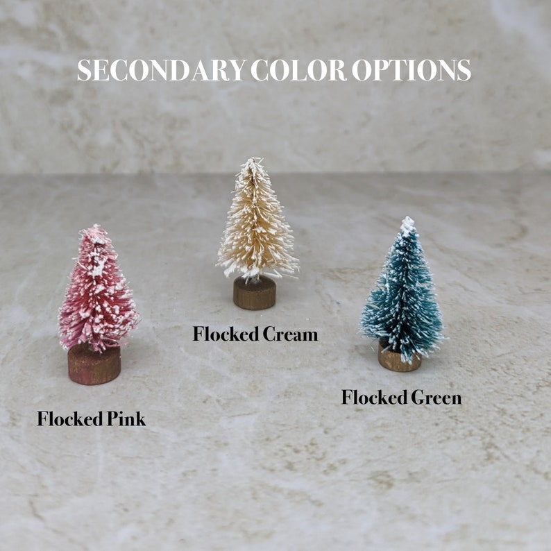Tree color options are flocked pink, flocked cream and flocked green