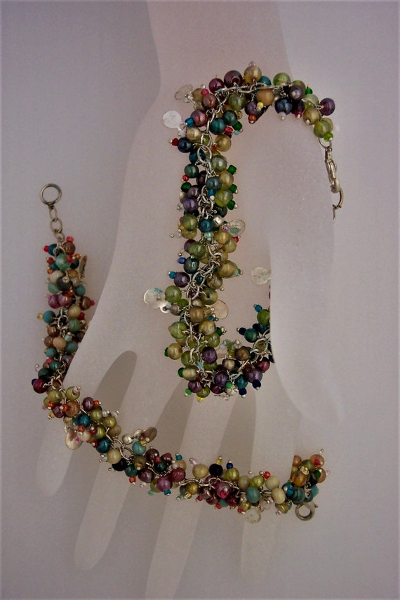 Tiny Balls of Multi Colored Glass Beads form a Un… - image 5