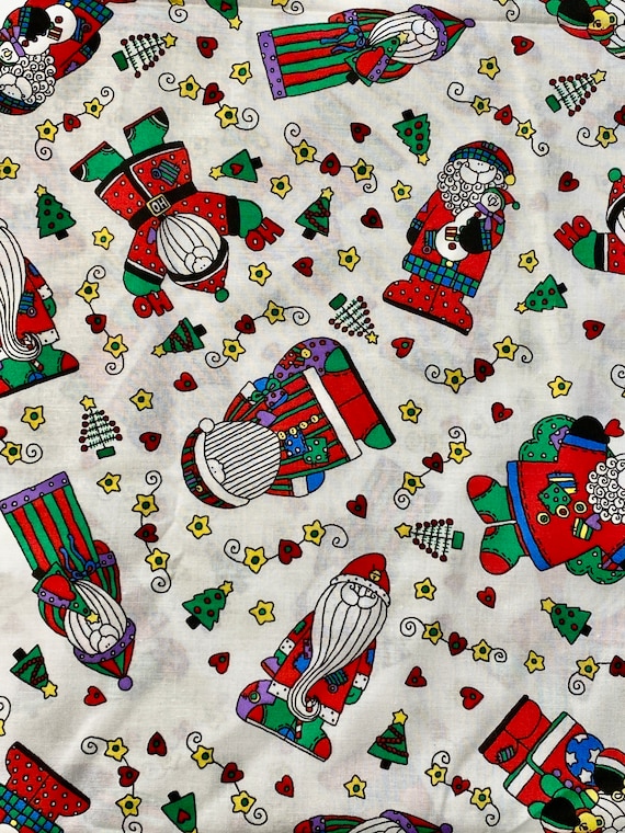 Ho, Ho Santas in Patched Suits by Sue Dreamer for Fabric Country: 44" wide, Sold by 1/2 yard