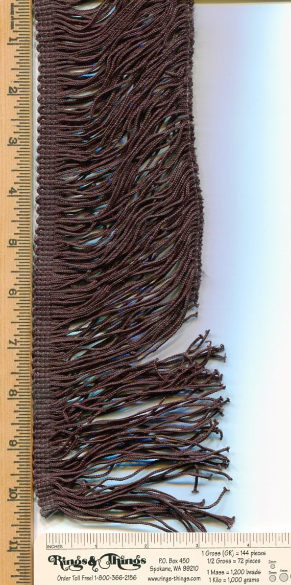 Black Fringe, 100% polyester, about 4" long, 2.75 yard piece.