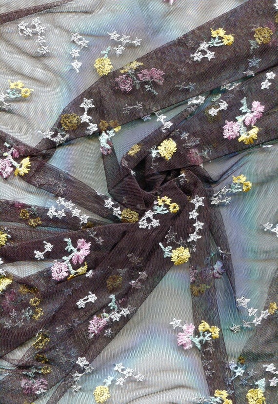Embroidered Flowers on Fine Netting:  A single piece = 1.25 yards long by 60" wide.