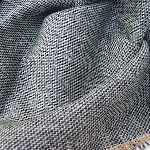 Black, White and Gray Tweed Fabric with a silver Metalic thread running through it.  60&quot; wide 1 3/8 yard piece