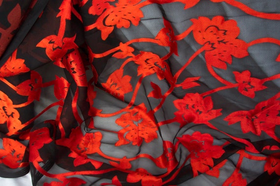 Burnout Fabric, Sheer, Red-Orange Floral on Black 43/44" wide by the yard
