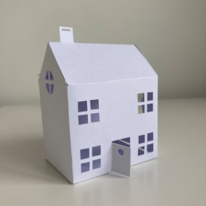 Casa tridimensional DIY cortada à mão