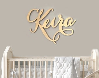 Gold Swirly Baby Name Sign Font