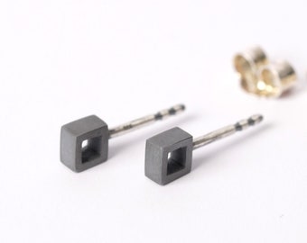 minimalistische Ohrstecker schwarz aus Silber für den Mann, schlichter geometrischer Schmuck