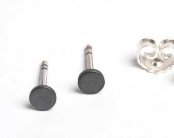 black simple geometric stud earring made of sterling silver, minimalist jewelry