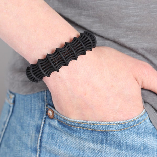 black bracelet for women in parametric jewelry style, a modern cuff bracelet
