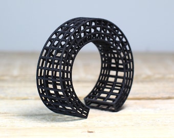 chunky cuff bracelet in black a piece of statement jewelry gift for her it's structure is eye catching