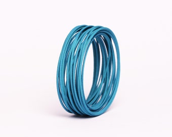 Wide bangle green blue bracelet a gift for women in a contemporary jewelry design