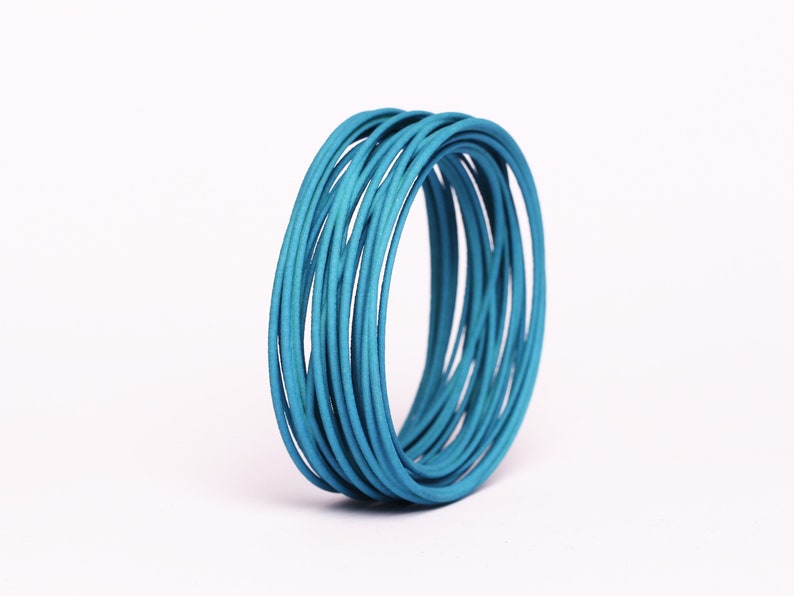 Wide bangle green blue bracelet a gift for women in a contemporary jewelry design petrol grün