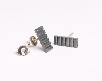 silver bar earring oxideced black, matt geometric studs in modern design and contemporary jewelry