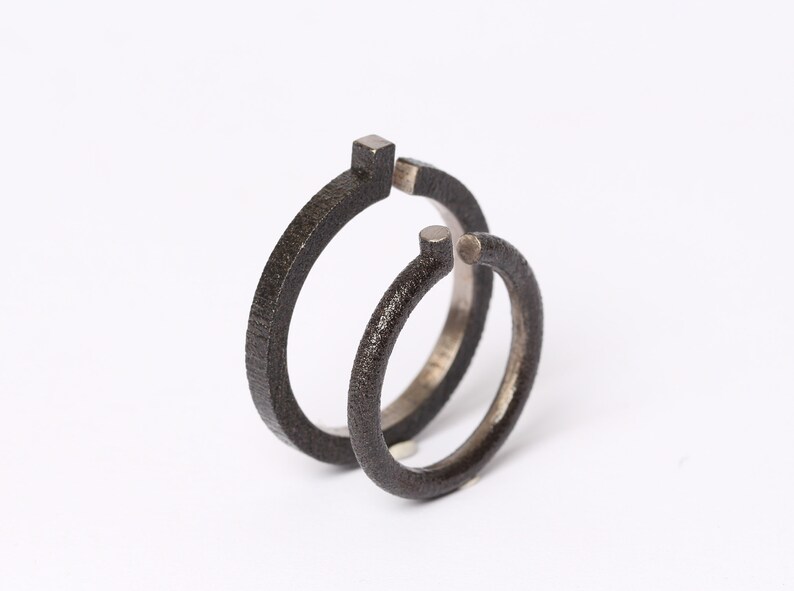 geometric friendship ring minimalist engagement ring made of black 3D printed steel