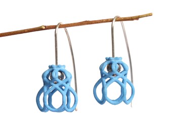 blue dangle earrings made of sterling silver and 3D printed nylon a modern floral design contemporary