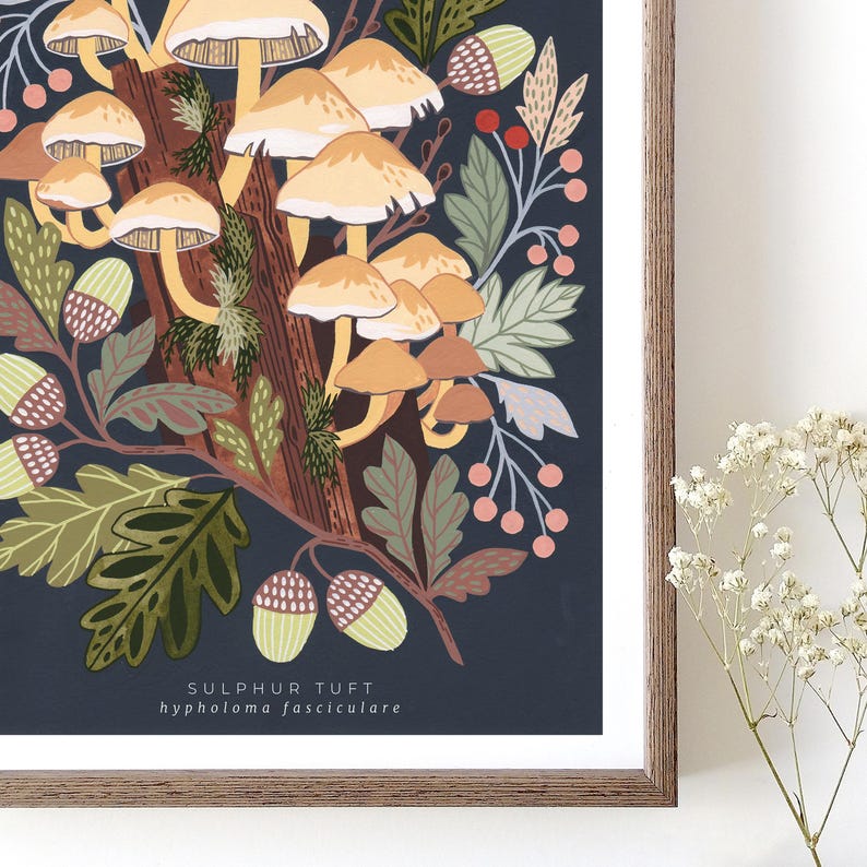 May include: A digital illustration of a cluster of yellow mushrooms growing on a tree trunk. The mushrooms are surrounded by green leaves, acorns, and berries. The background is a dark blue color. The text "SULPHUR TUFT hypholoma fasciculare" is printed below the image.