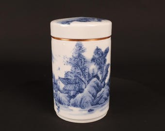Tarro de té de porcelana azul y blanca con diseño de paisaje / tarro sellado
