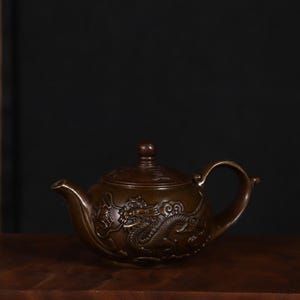 Copper dragon and phoenix patterned teapot,wine pot,tea set craftsmanship,hand carving,home decoration,unique design,can be used