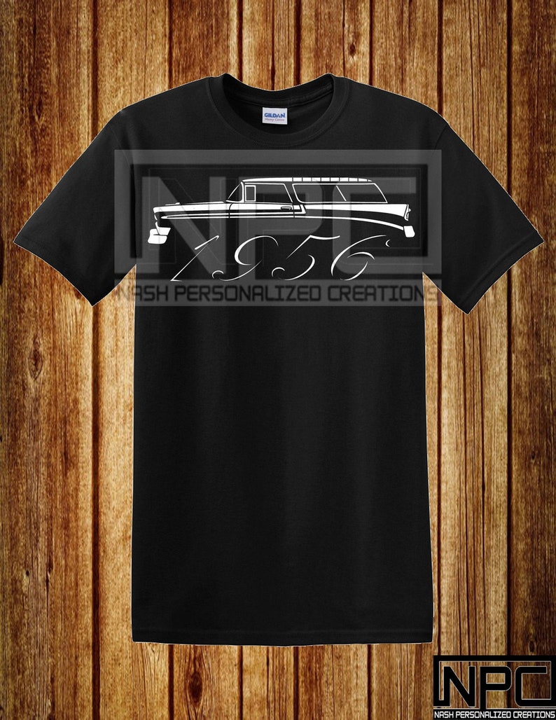 May include: Black t-shirt featuring a white graphic of a vintage hearse with the year "1956" and the text "NASH PERSONALIZED CREATIONS". The shirt has a crew neck and short sleeves.