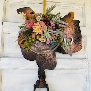 Leather Look succulent flower Western Saddle - Lariat Farmhouse Wall Art - Western Stirrup Wood  Wreath - Faux Tooled Leather Western Saddle