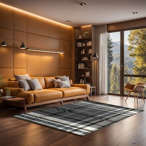 May include: A black and white plaid rug with a green border in a living room featuring a brown leather sofa, a bookshelf, and a window with a view of trees.